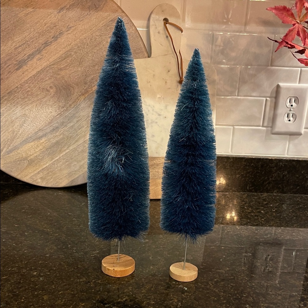 Pair of Blue Holiday Decor Trees one with smash can be positioned to back